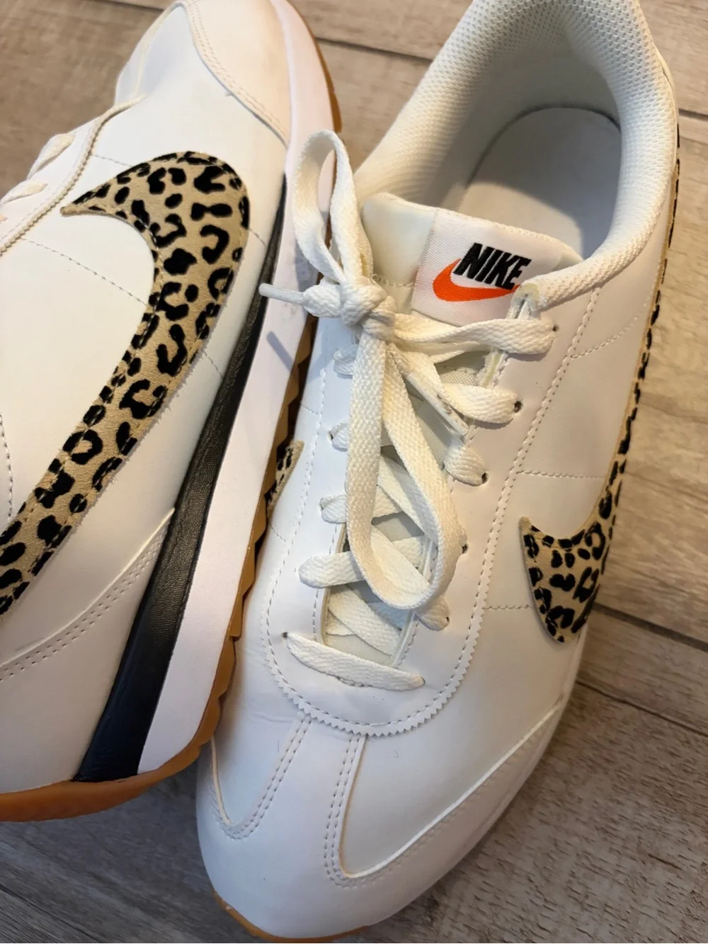 Nike Women's White Sneakers with Leopard Swoosh and Orange Heel Tab